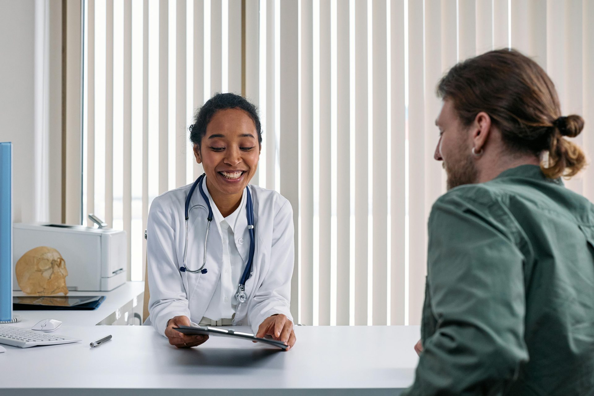 Licensed health insurance advisor consulting with a client about a private PPO health plan